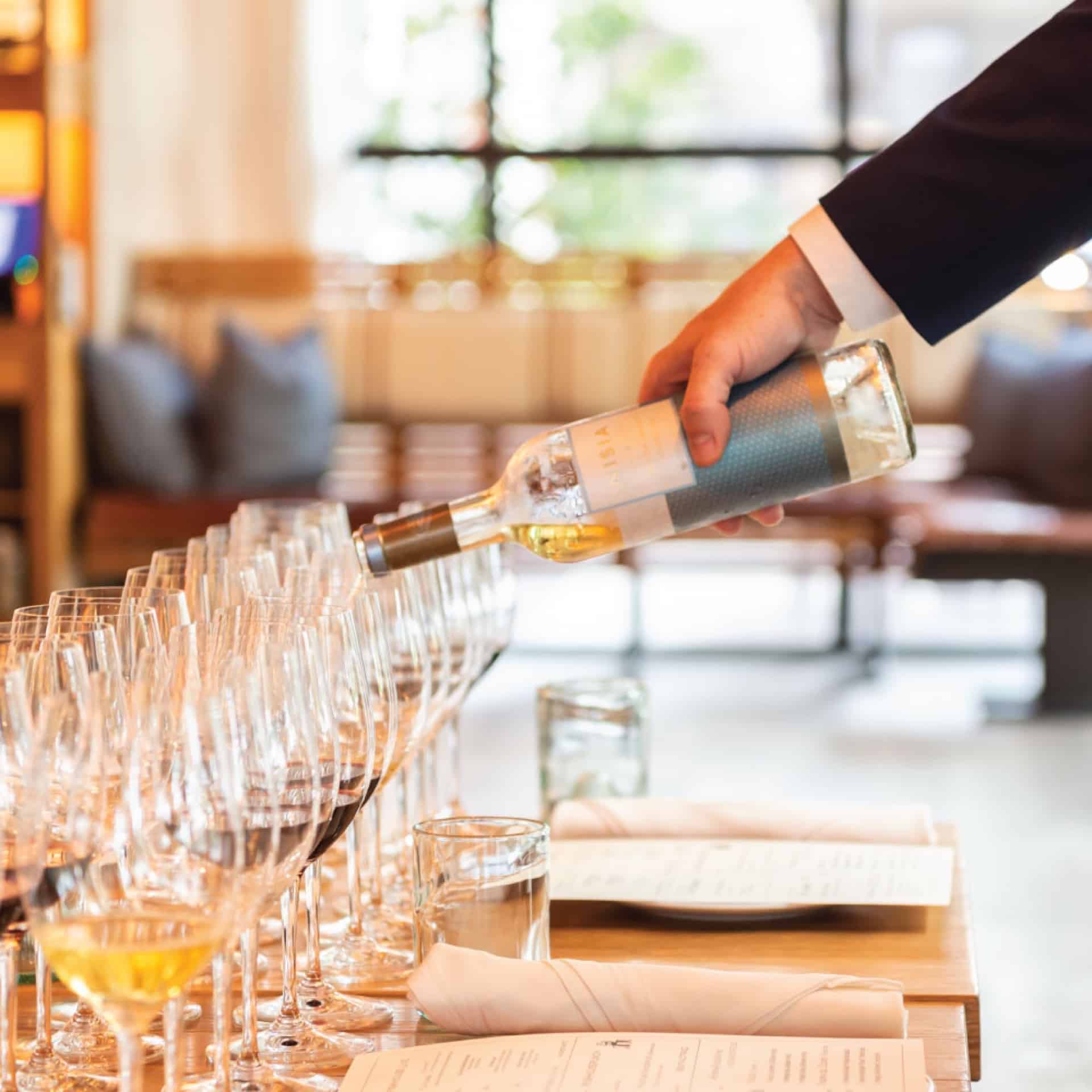 A glass of Rueda Verdejo poured tableside
